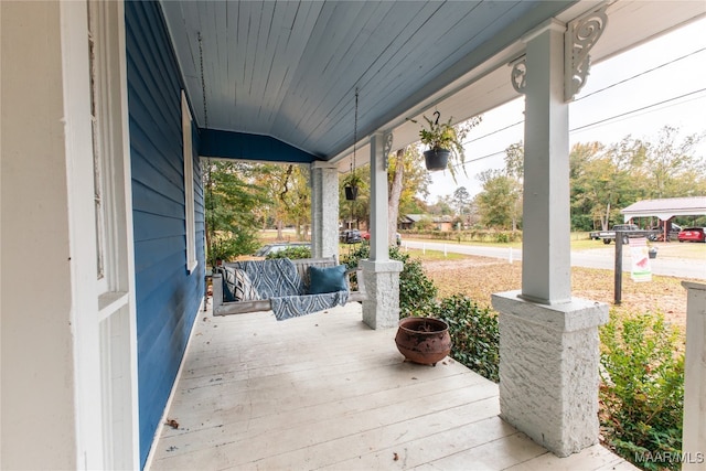 deck with covered porch