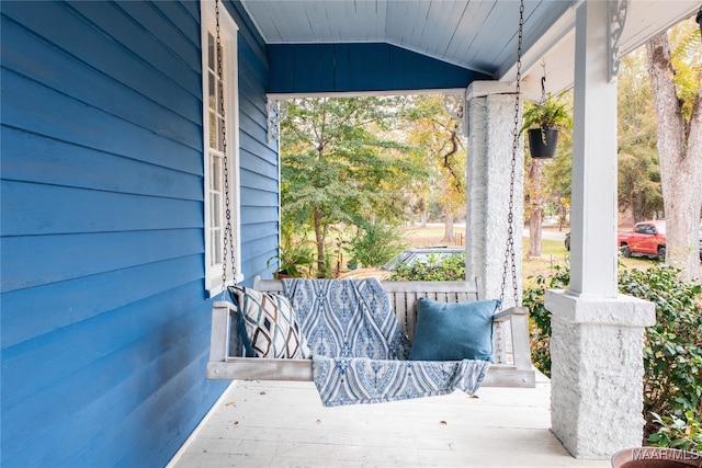 view of patio featuring a porch