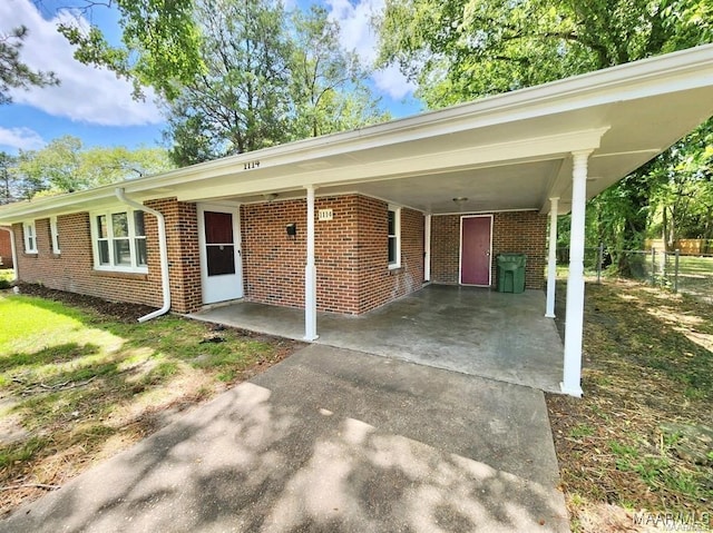 view of front of home with a carport