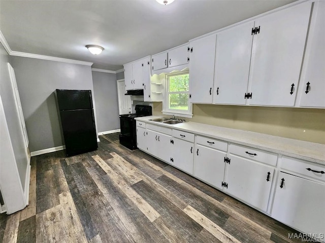 kitchen featuring sink, black appliances, crown molding, white cabinets, and dark hardwood / wood-style flooring