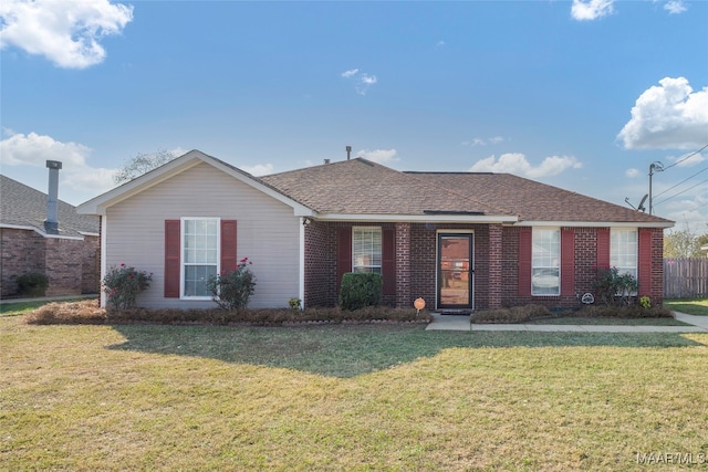 ranch-style house featuring a front yard