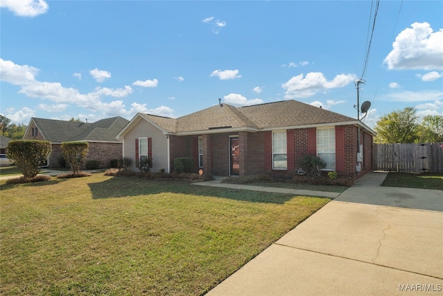 ranch-style home with a front yard