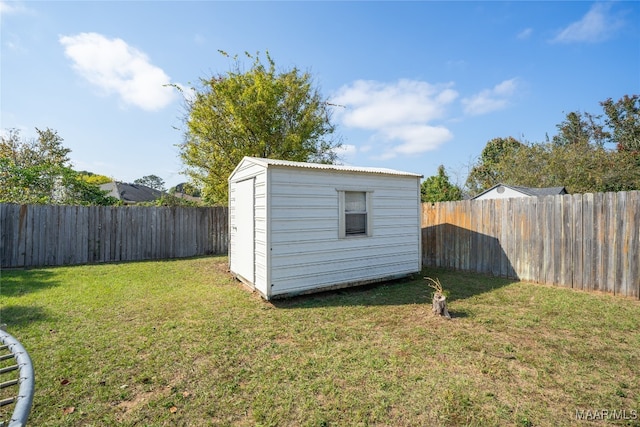 view of outdoor structure featuring a yard