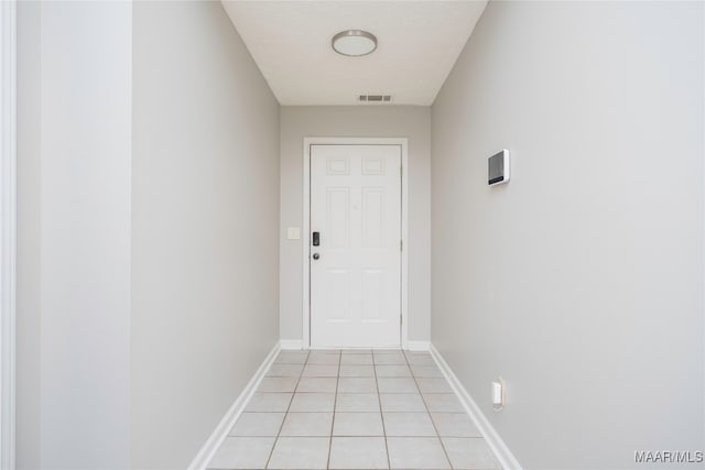 entryway featuring light tile patterned floors