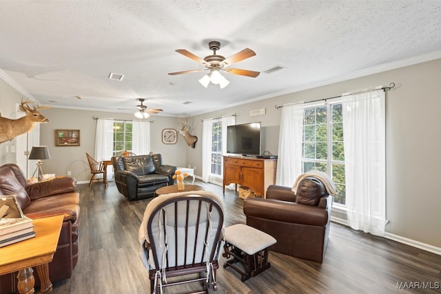 living room with ceiling fan, crown molding, a textured ceiling, and dark hardwood / wood-style flooring