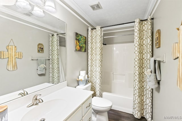 full bathroom featuring toilet, shower / tub combo, hardwood / wood-style floors, crown molding, and vanity