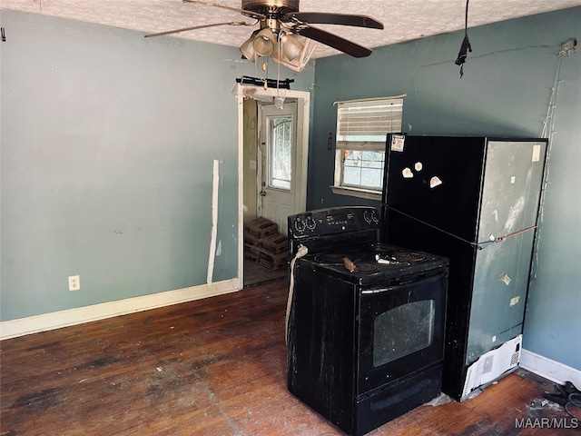 kitchen with dark wood-type flooring, ceiling fan, black appliances, and a textured ceiling