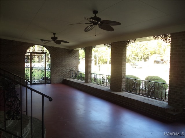 view of patio featuring ceiling fan