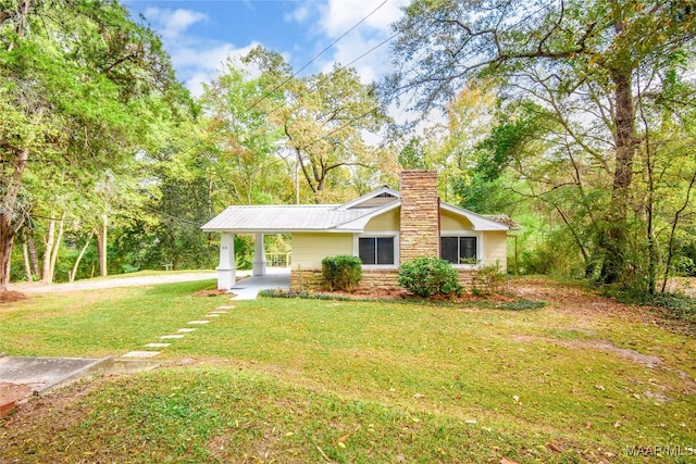 ranch-style house with a front lawn