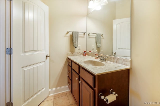 bathroom featuring tile patterned floors and vanity