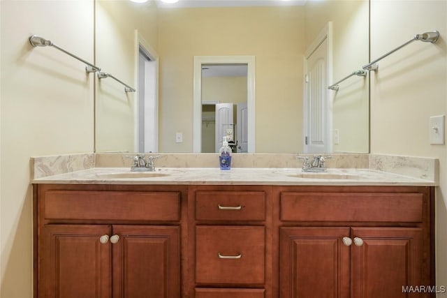 full bathroom featuring double vanity