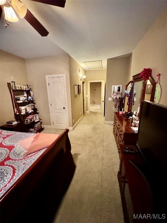 carpeted bedroom featuring ceiling fan