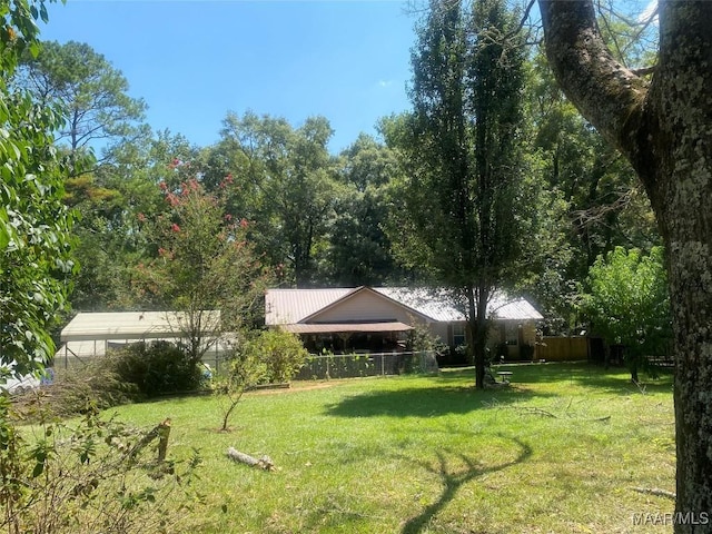 view of yard featuring fence
