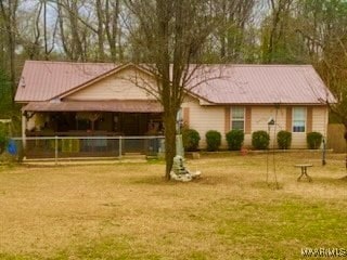 view of home's community featuring a yard