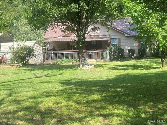 view of yard with fence