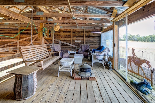 interior space featuring lofted ceiling with beams