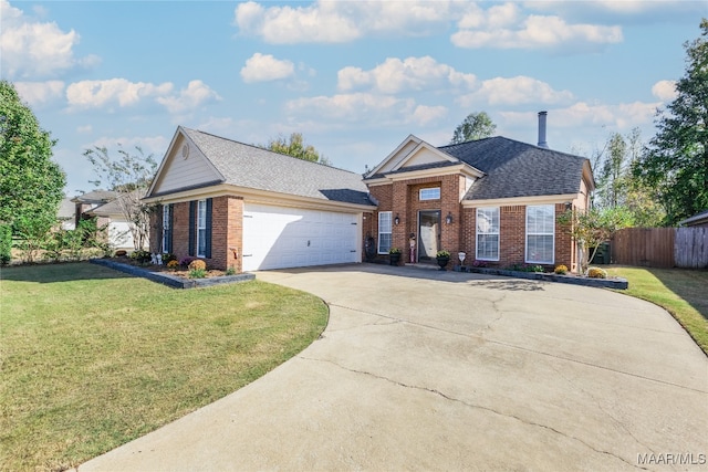 view of front facade with a garage and a front yard