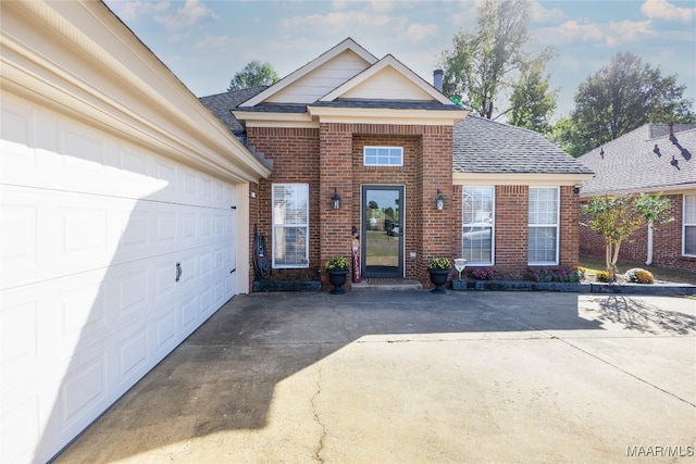 view of front of home with a garage