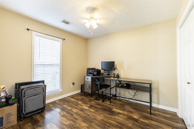 office area featuring a textured ceiling, dark hardwood / wood-style floors, and ceiling fan