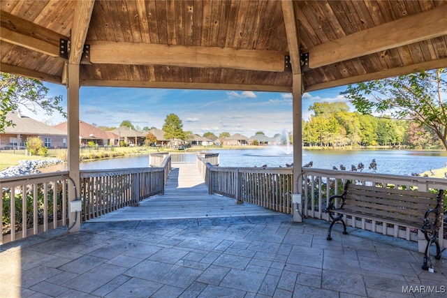 view of patio / terrace with a water view