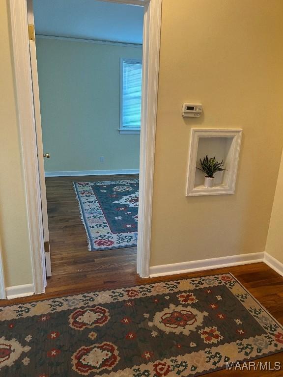 hallway featuring hardwood / wood-style floors