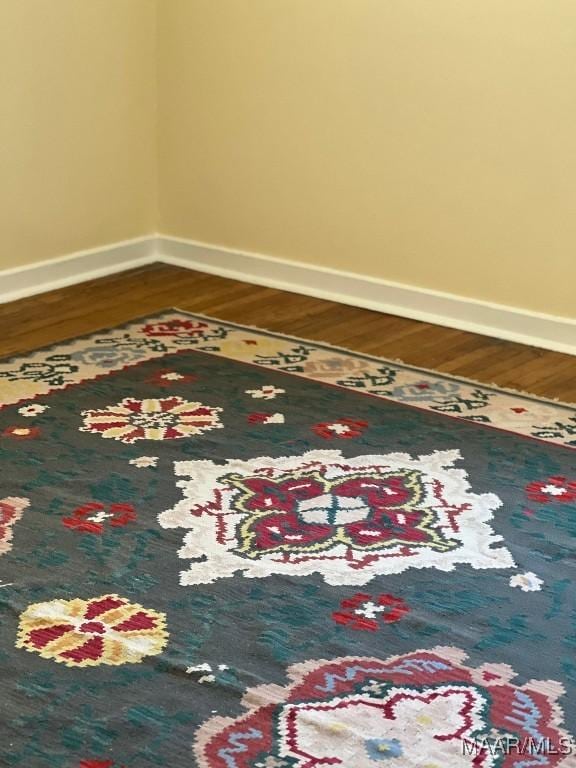 interior details featuring hardwood / wood-style floors