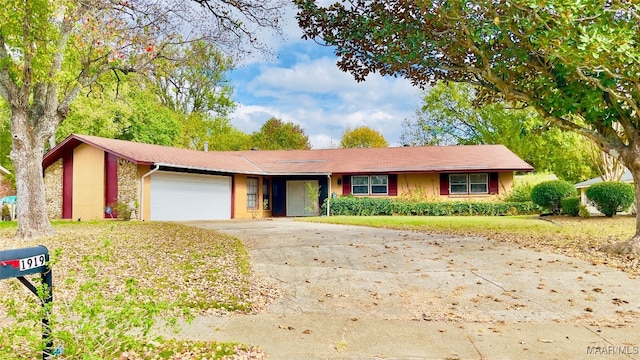 ranch-style house with a garage