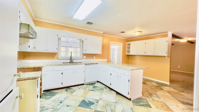 kitchen with white dishwasher and white cabinetry