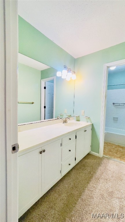 bathroom featuring vanity and shower / bath combination