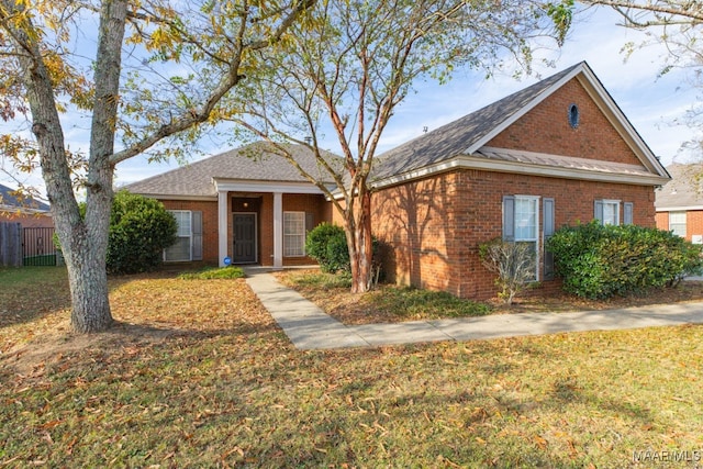 view of front of home with a front lawn