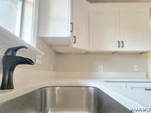 details featuring white cabinets