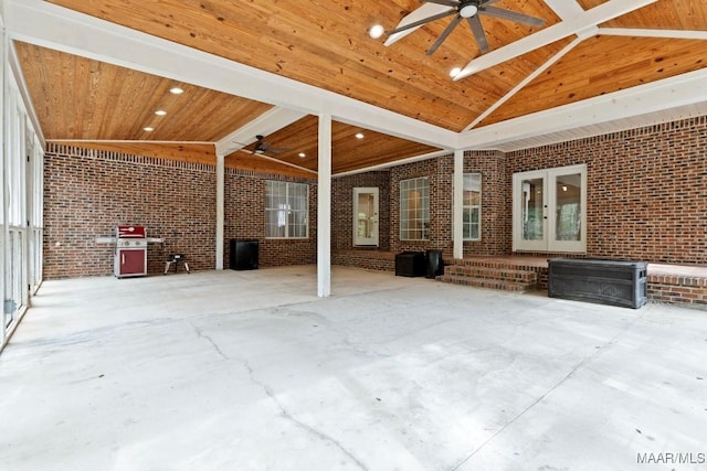 interior space with ceiling fan and area for grilling