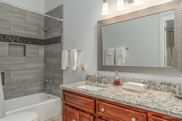 full bathroom with toilet, shower / tub combo, and vanity