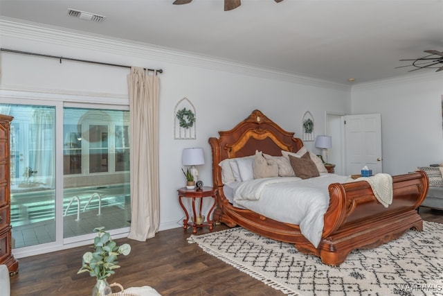 bedroom featuring access to exterior, dark wood-type flooring, ceiling fan, and crown molding