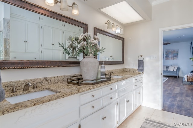 bathroom with vanity and tile patterned floors