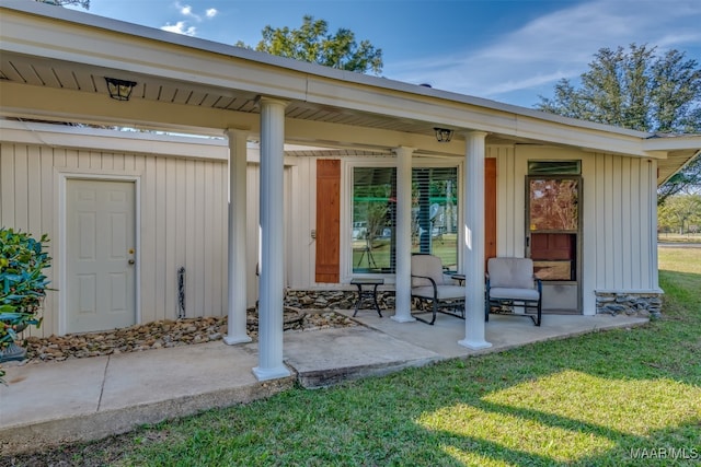 exterior space featuring a patio and a lawn