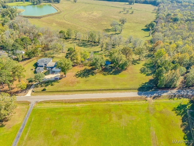 bird's eye view featuring a water view and a rural view