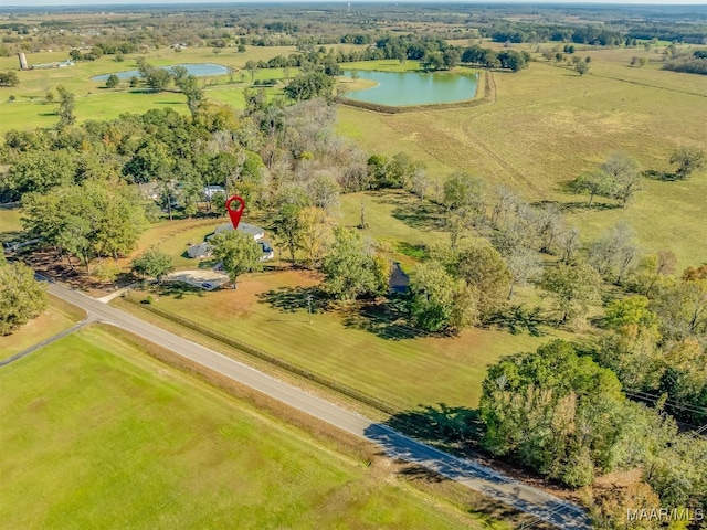 bird's eye view featuring a water view and a rural view