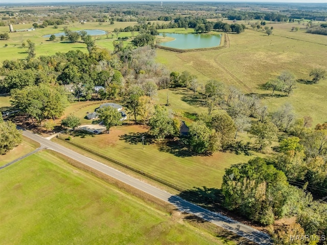 aerial view with a water view and a rural view