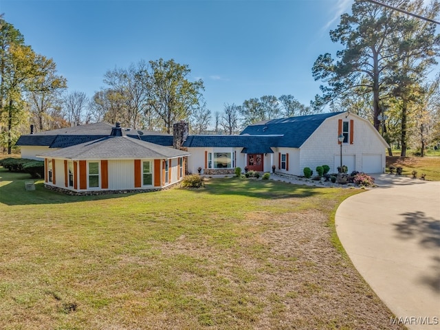 rear view of house with a yard