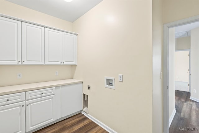 laundry room with cabinets, dark hardwood / wood-style floors, hookup for a washing machine, and electric dryer hookup