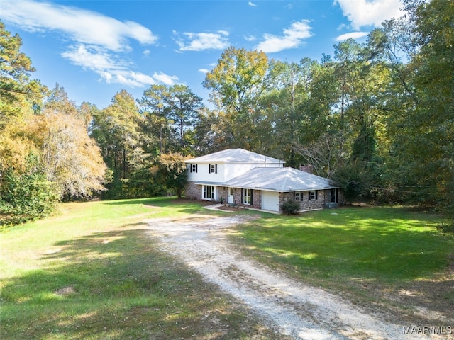 view of front of home with a front lawn