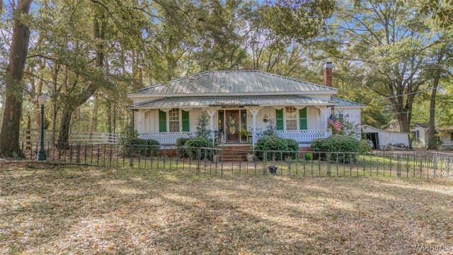 view of front of home featuring covered porch