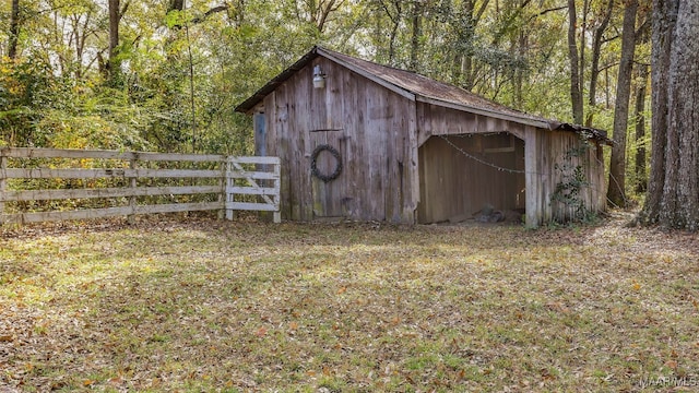 view of outdoor structure with a yard