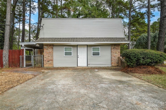 garage featuring a carport