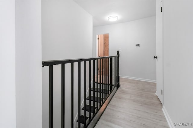 corridor featuring light hardwood / wood-style flooring