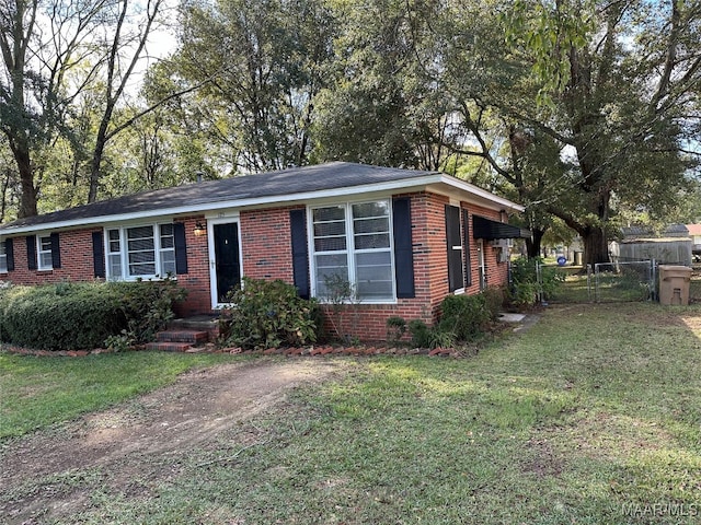 ranch-style house with a front yard