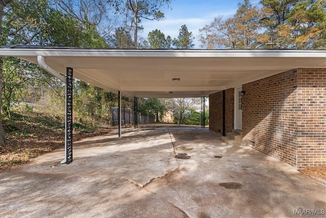 view of vehicle parking featuring a carport