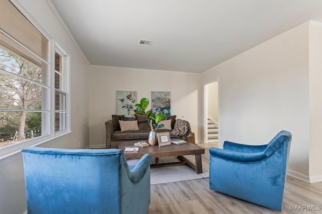 living room with light hardwood / wood-style floors