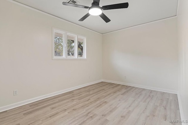 unfurnished room featuring ceiling fan, ornamental molding, and light wood-type flooring